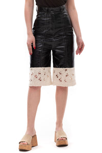 Edge Contrast – cropped eco-leather and knit shorts
