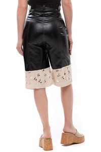 Edge Contrast – cropped eco-leather and knit shorts