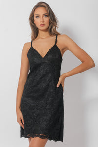 Short lace dress on a satin base with a triangular neckline