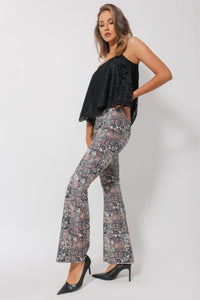 High-waisted bell-bottom pants with a graphic print